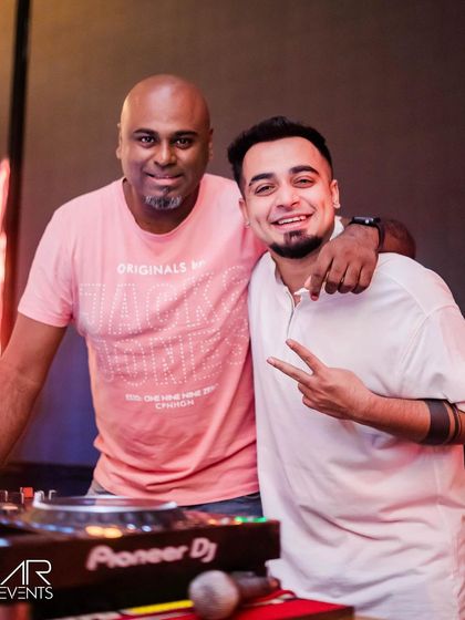 Posing with DJ Milan, my partner in crime for Wednesday nights.