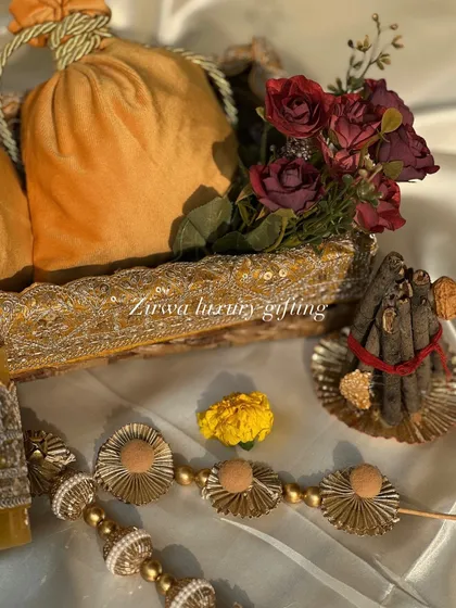 This image shows the complete yellow-themed Lohri hamper, including a miniature bonfire, capturing the full essence of the festival in one beautiful arrangement.