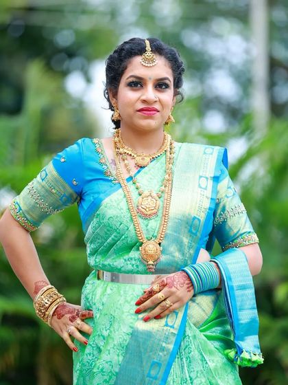 Another powerful pose, showing how the entire look comes together to create a stunning appearance for a wedding guest.