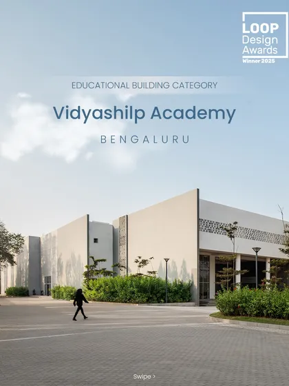 This image captures the entrance of the award-winning Vidyashilp Academy. The architecture is designed to be welcoming and accessible, with clean lines and a strong connection to the surrounding landscape, setting the tone for a nurturing learning environment.