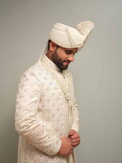 A side profile showcasing the clean hairstyle and the flawless finish of the makeup. I make sure every angle is picture perfect for your wedding album.