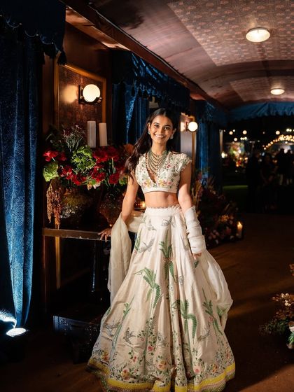 A guest enjoying the immersive "Golden Rails" experience. The decor provided a stunning and unique backdrop for photos.