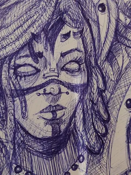 A close-up of the fantasy character sketch, showing the intricate line work in the hair, face markings, and surrounding details.