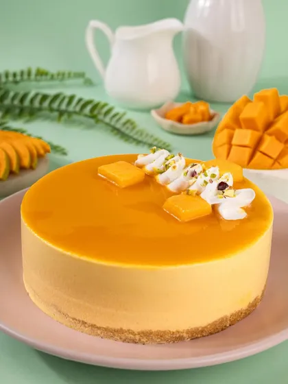 A clean, bright, and airy style is perfect for making fresh desserts like this mango cheesecake look absolutely mouthwatering. My focus here was on the glossy glaze and smooth texture, making it look light and delicious.