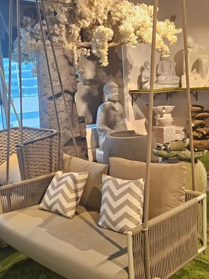 A comfortable garden swing is a must-have for any outdoor space. This elegant, modern swing, displayed in our showroom, is perfect for relaxing on a lazy afternoon.