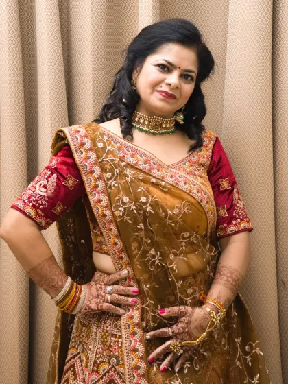 A final portrait from the lehenga series, showing a confident and classic pose suitable for a bridal or occasion wear portfolio.