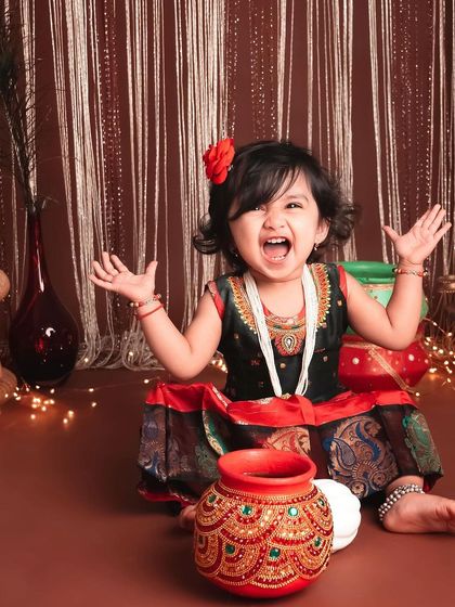 The biggest, happiest shout of joy! This photo perfectly captures the fun and energy of a child's photoshoot.