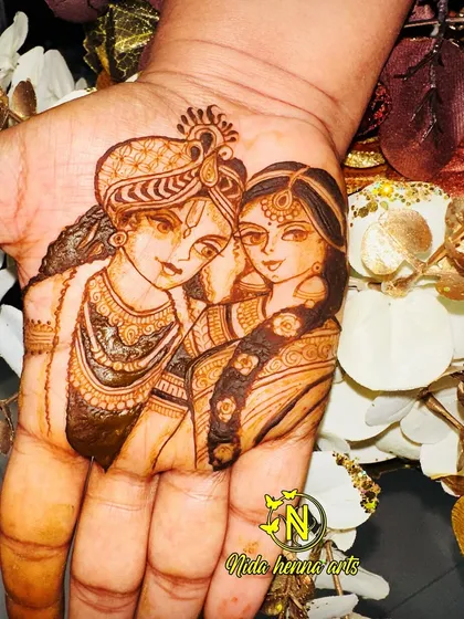 A close up of the Radha Krishna portrait. The fine lines and shading bring the figures to life, creating a piece of art that is both beautiful and meaningful.