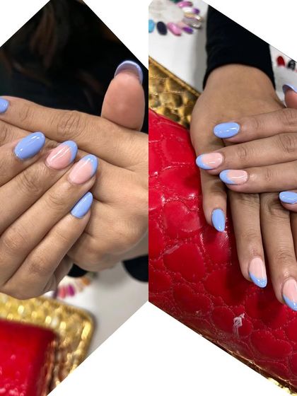 A playful version of the French manicure using a soft pastel blue. This design shows how color can be used to create a fun yet understated look.
