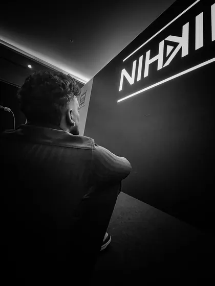 A quiet moment of reflection before a big show. I always take time to get into the right headspace to deliver my best performance.