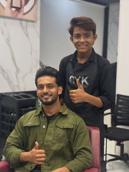 Another satisfied customer giving a thumbs-up for his fresh haircut. It's all about making my clients feel their best.