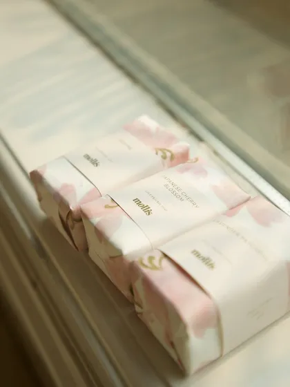 The soft, pink floral packaging was perfect for this joyous occasion.