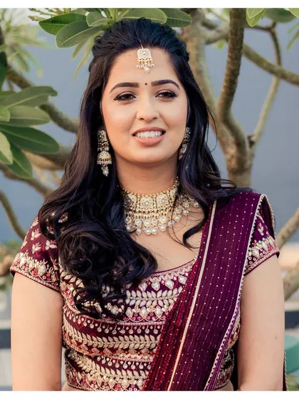 A portrait of Akshaya, ready to set the stage on fire. The bold eye makeup is balanced with soft, neutral skin work for a stunning effect.