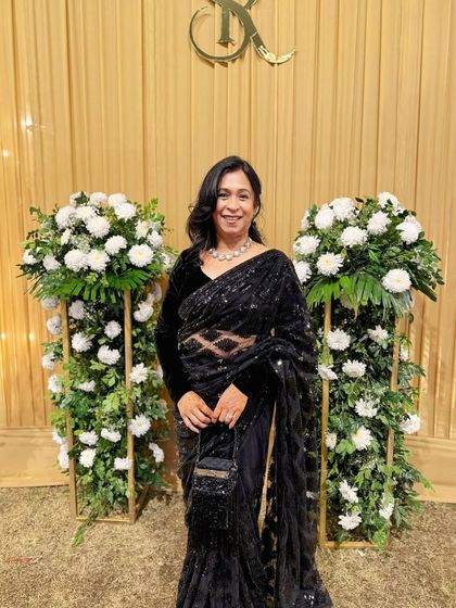 A client looking absolutely timeless in a black sequin saree. I work with you to find the perfect balance of glamour and sophistication, ensuring the fit and drape are flawless for your special event.