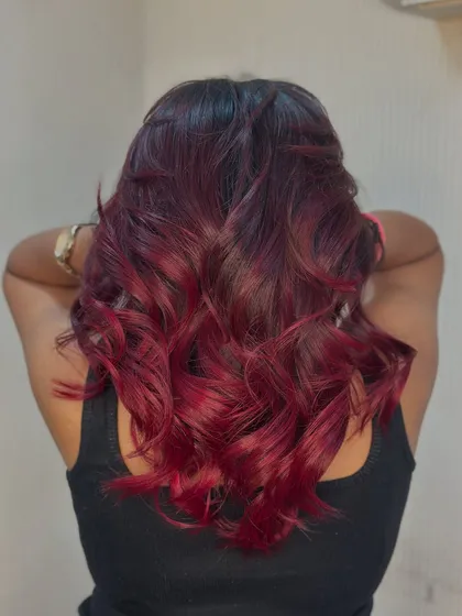 The back view of this incredible red ombre, showcasing the volume and intensity of the color.
