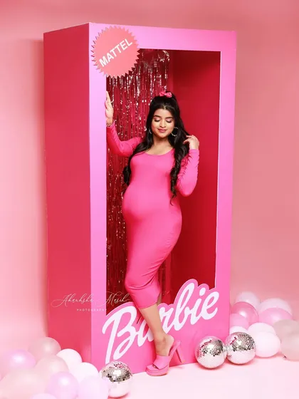 Another fabulous look from the Barbie box session, showcasing a confident pose and the vibrant pink theme.