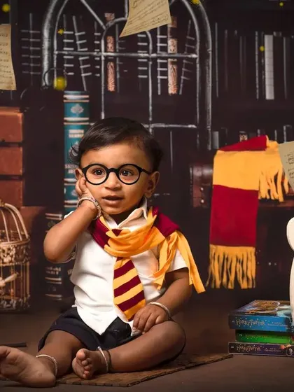 A close-up of a happy little wizard. These mini sessions are a great way to get a few magical portraits of your child in their favorite theme.