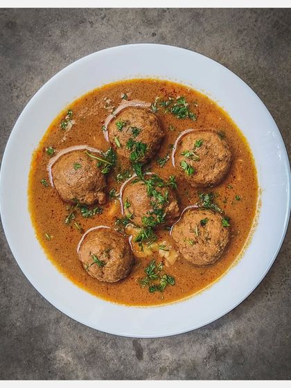 A bowl of my signature Khaima Unde Saaru, with perfectly formed minced lamb meatballs swimming in a rich, aromatic curry.