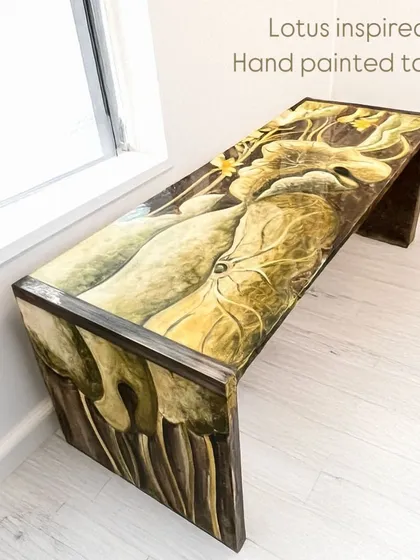 Our lotus-inspired table, a stunning piece of functional art. The entire surface is hand-painted, transforming a simple bench into a celebration of nature and Indian craftsmanship.