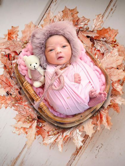 Here, the same setup is enhanced with a digital backdrop of autumn leaves, showing how I can add a creative touch to a classic portrait.