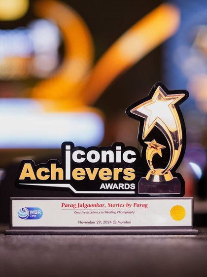 A close-up of the Iconic Achievers Award trophy. This recognition for 'Creative Excellence in Wedding Photography' is a milestone that I am incredibly proud of and grateful for.