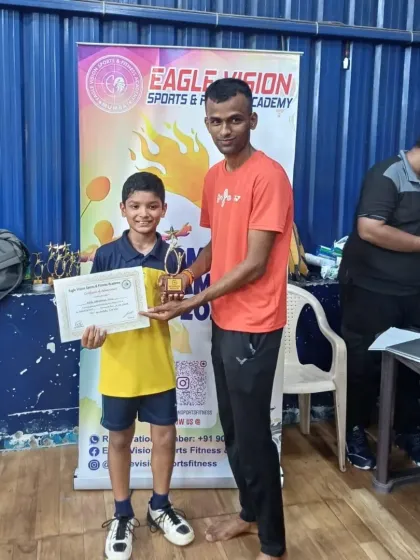 Rhys Pais receiving the winner's trophy for the U13 Boys Singles title. A proud moment for our academy.