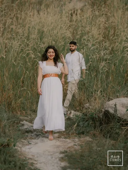 The pure, uninhibited joy of running through a field together. My goal is to create a space where you can be yourselves, resulting in candid engagement photos that are full of life and laughter.