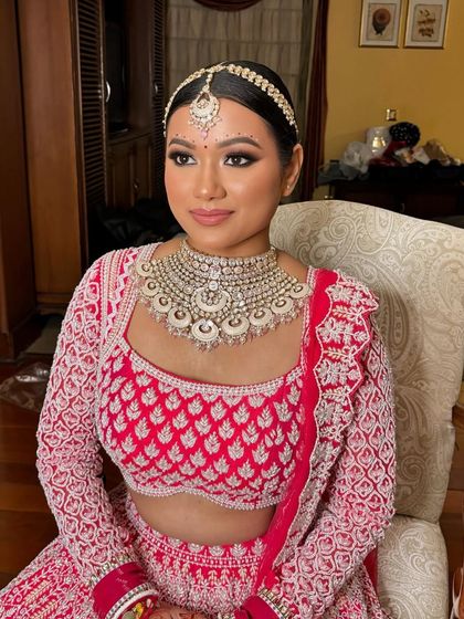 Another angle of Rubina's bridal makeup, showing how the look comes together with her jewelry and outfit.
