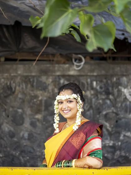 A beautiful portrait of the bride, Suyoga, in her traditional Maharashtrian attire.