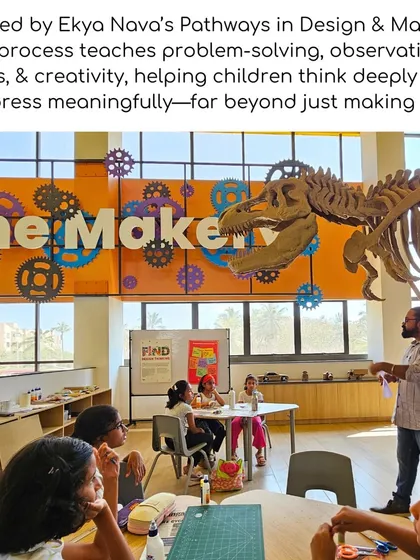 A student works on a project in The Makery, a space designed for hands-on learning. The environment, complete with a giant dinosaur skeleton, inspires children to think big and express themselves meaningfully.