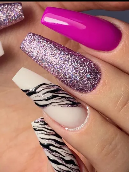 A close-up of the different textures in this set, from the glossy pink to the sparkling glitter and the graphic zebra print.