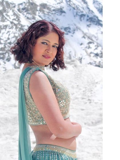 A lovely profile shot that showcases the outfit's details.