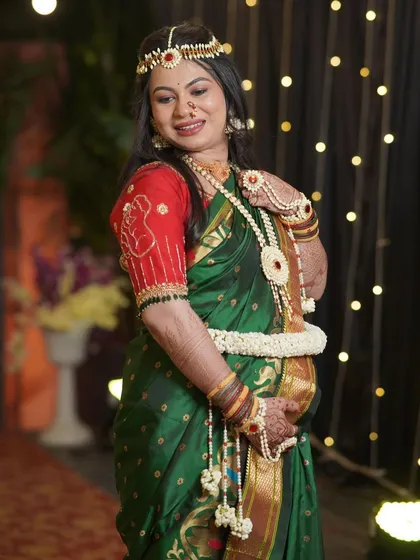 A portrait of the mom-to-be, cradling her baby bump. Our custom floral jewellery is designed to make these precious moments even more memorable.