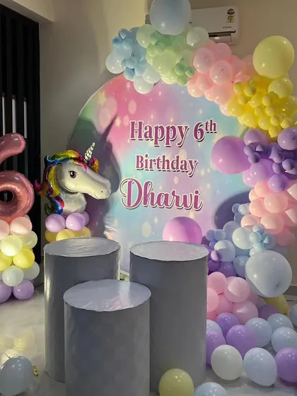I designed this magical unicorn-themed party for a 6th birthday. The decor features a pastel rainbow balloon garland, a large unicorn foil balloon, and a personalized circular backdrop, creating a dreamy setting perfect for any unicorn lover.