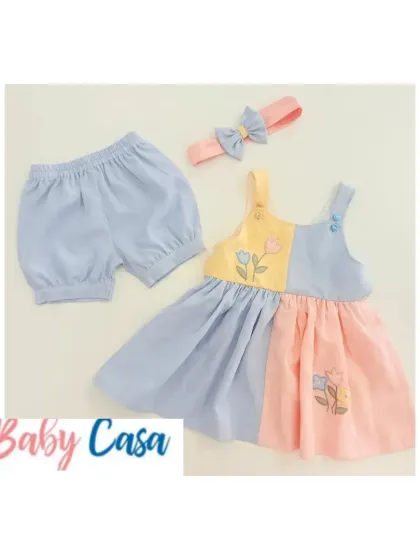 A lovely pastel color-block dress with matching bloomers and a headband. This is a comfortable and stylish choice for everyday wear.