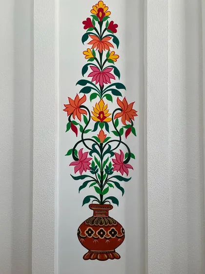 Close-up of one of the Kalamkari floral vase paintings.