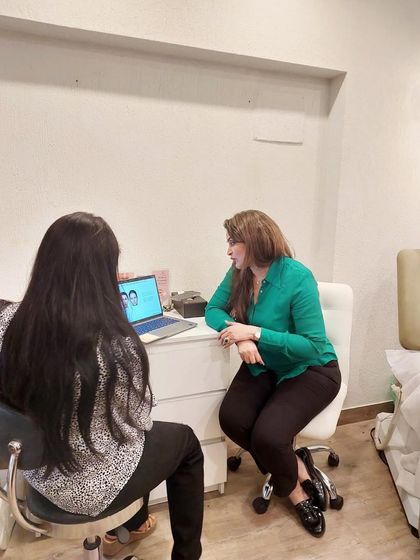 Here I am training another doctor on injectable techniques. Sharing knowledge is the first step to humanity, and I find great fulfillment in mentoring others in the practice of safe and effective cosmetic dermatology.