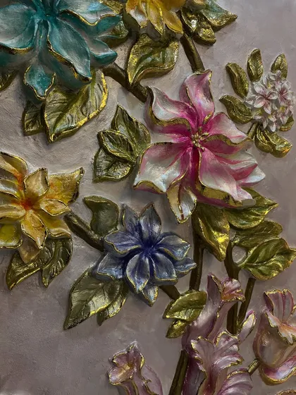 An extreme close-up of the hand-painted flowers. I love adding these small, intricate details with gold leaf accents.