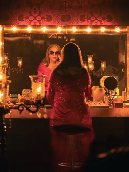 The moment before the magic. Here's the iconic Zeenat Aman in her vanity, wearing a custom-designed disco gown I created in just 36 hours for the Mia by Tanishq campaign. This project was a dream come true, blending classic glamour with modern commercial styling.