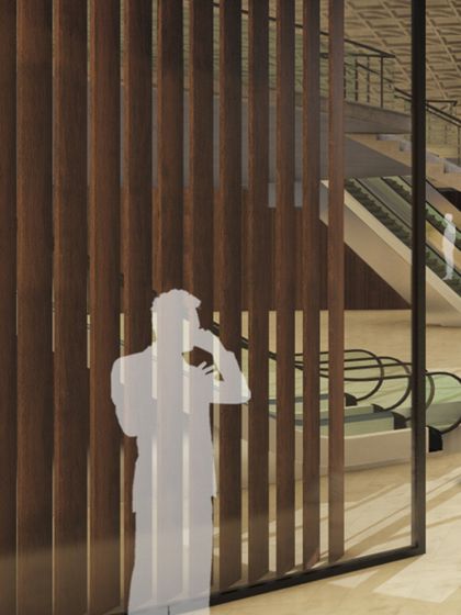 This rendering focuses on the interior of a large commercial space, showing escalators and wooden slat partitions. The design is a blend of simplicity and functionality, carefully considered for optimal flow and business vibes.