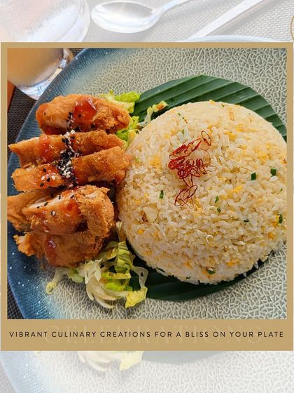 A plate of chicken katsu and fried rice from a destination event, proving that we can deliver a diverse and delicious menu anywhere.