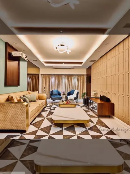 For this living room, we played with bold geometric patterns. The black and white marble flooring creates a high-contrast foundation, balanced by the warmth of the tan leather sofa and textured wall panels.