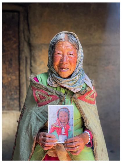I met this woman in Hikkim village, Spiti, and she showed me an old photo of herself. I captured this portrait of her holding that memory, a bridge between her past and present.