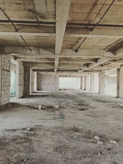 A wide view of a floor in the commercial building, showing the large, open-plan space typical of modern office design.