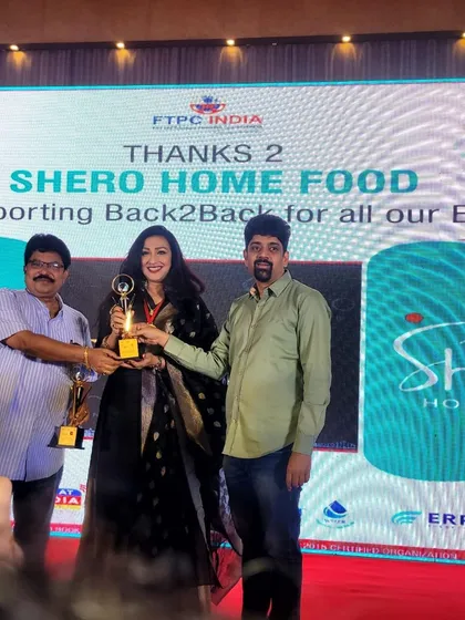 A shot from the FTPC Awards stage, with our branding visible in the background. Our support for these events is part of our mission to uplift and celebrate those who make a significant impact in their fields.