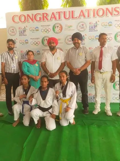 Our senior and junior female fighters showing their medals from the National Sikh Games. A powerful display of skill across different age groups.