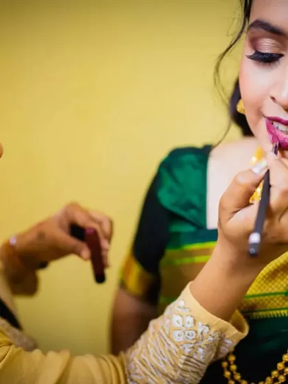 The final touch. Applying lipstick is one of the last steps, bringing the entire makeup look together. Here, I'm using a precise brush for a perfectly defined lip shape.
