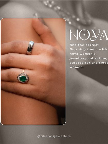 The perfect finishing touch for the modern woman. This image showcases a stunning emerald and diamond halo ring, paired with a simple, elegant band from our Noya collection.