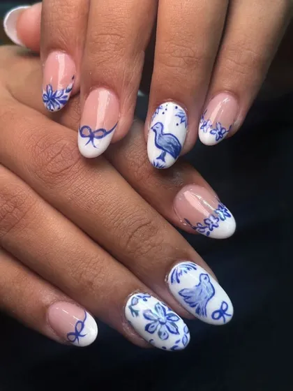 Art is where I have the most fun. I love hand-painting tiny details, like this blue and white design inspired by classic pottery. Each element, from the birds to the delicate bows, is carefully painted to create a unique, wearable piece of art.