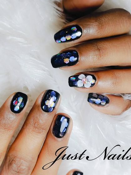 Another view of the iridescent floral glitter design, showing how the colors shift in the light.